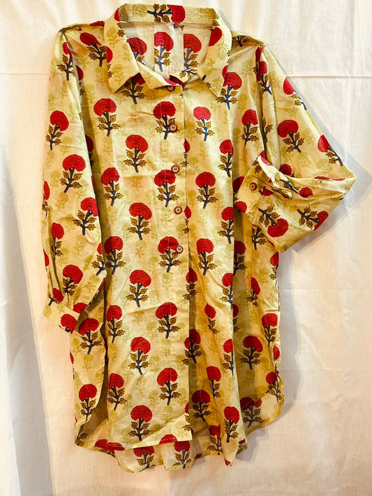 A vibrant marigold floral two-piece  Pakistani suit, perfect for summer. Marigold Pakistani Top.