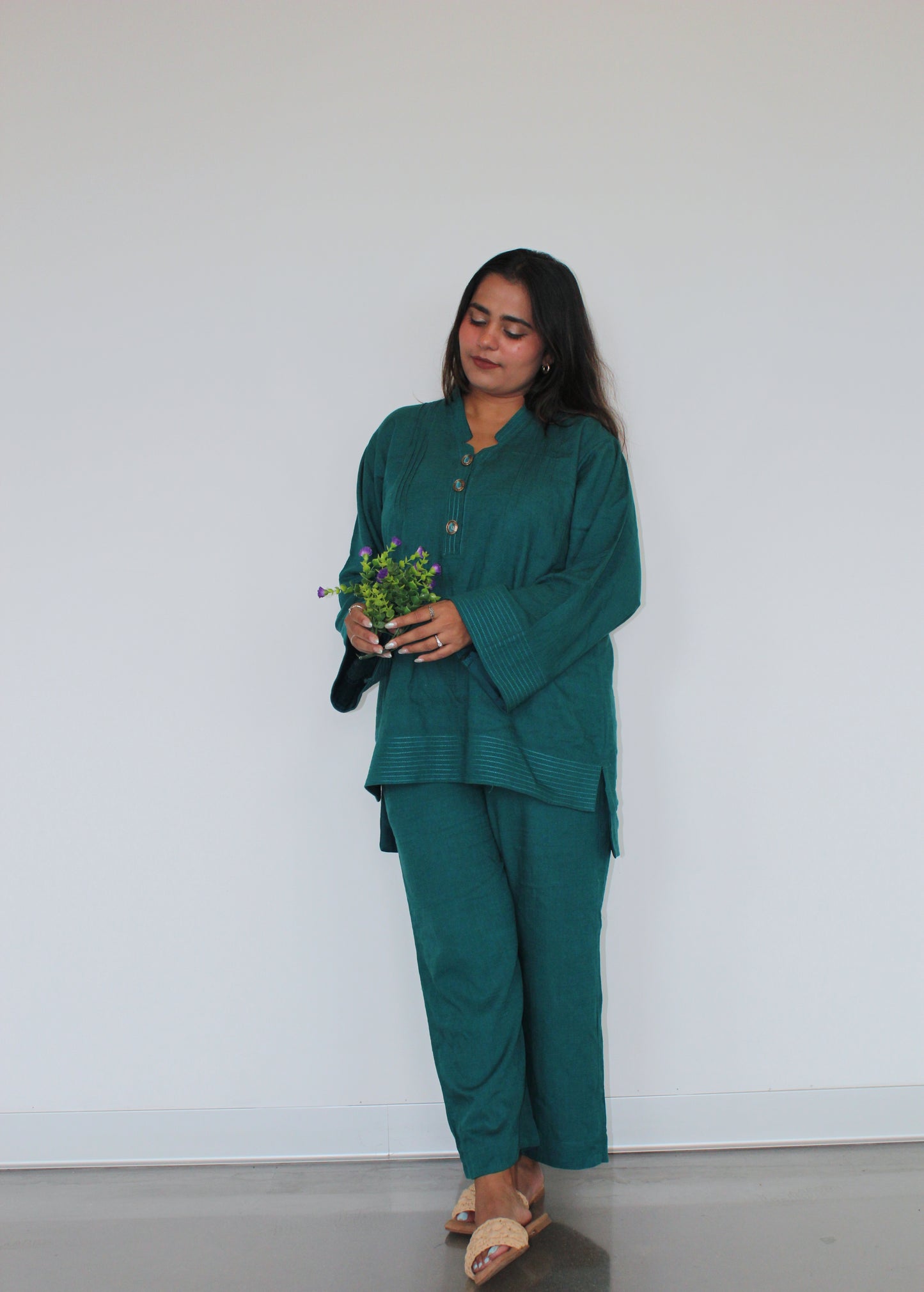 Teal linen pants from our Teal Pakistani Suit, perfect for fall and winter. Comfortable and stylish, these pants complement our Teal Top. Full look.